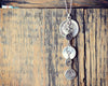 Cascade five button necklace