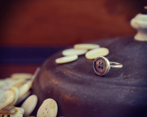 Dark grey button ring
